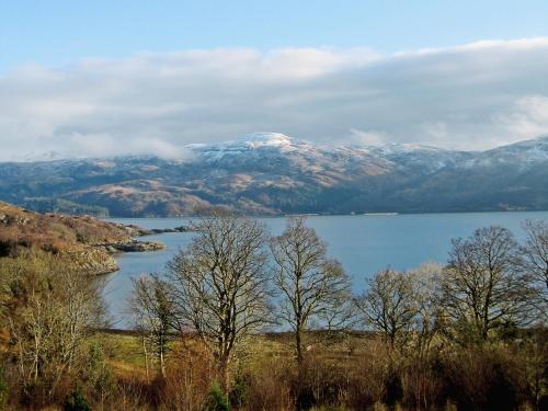 a view of a lake with a snow covered mountain at West Bothy in Glenborrodale