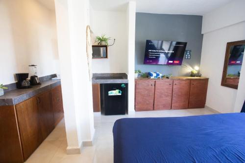 Una cocina o zona de cocina en Maui Hostels Playa del Carmen
