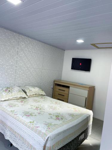 Postel nebo postele na pokoji v ubytování Pousada aconchego