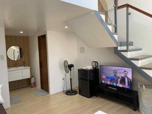 TV a/nebo společenská místnost v ubytování Yanis Resort