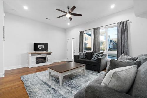 a living room with a couch and a table at Unit #C 527 N 1st St in Clarksville