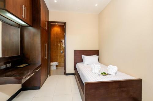 Voodi või voodid majutusasutuse The Retreat Koh Samui toas