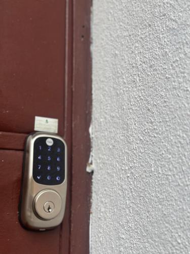 a remote control sticking out of a door at Hotel Boutique CasAguacate close to Airport, Pedregal, Centro de Convenciones de Costa Rica in Potrerillos