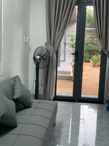 Χώρος καθιστικού στο Homestay Buôn Mê 1