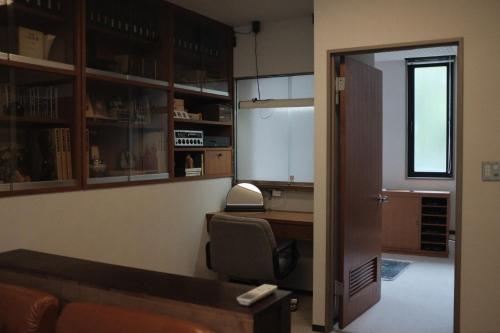 a room with a office with a desk and a chair at Law Firm ローファーム in Nagano