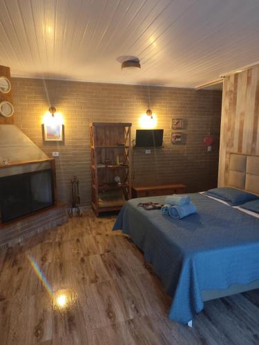 Кровать или кровати в номере Espaço São José