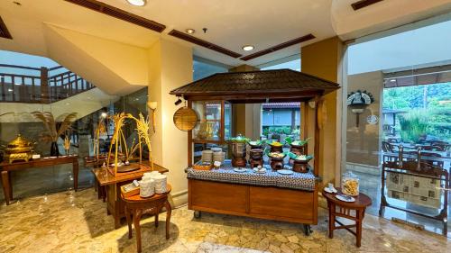 a shop with a display of items in a room at Lorin Solo Hotel in Solo