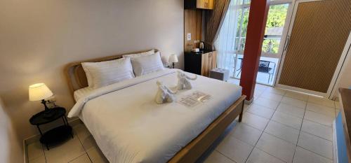 Katil atau katil-katil dalam bilik di Lenny's Koh Samui