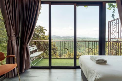 Postel nebo postele na pokoji v ubytování Bilut Hills Eco Resort