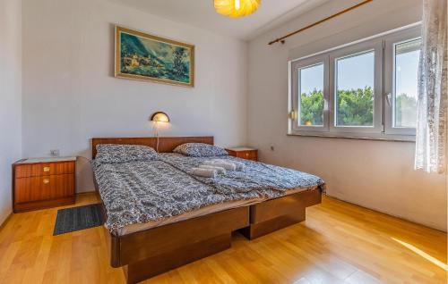 Ένα ή περισσότερα κρεβάτια σε δωμάτιο στο Awesome Apartment In Liznjan With Wifi