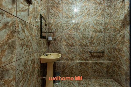 Ένα μπάνιο στο Chacara em Juatuba com varanda Gourmet e Piscina