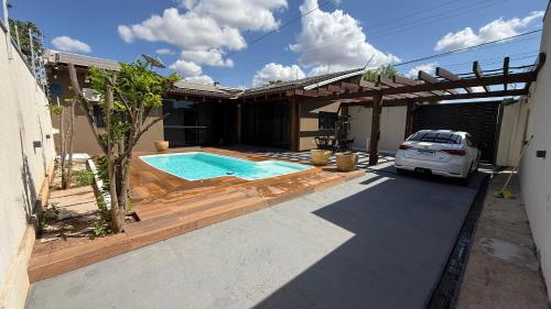 Πισίνα στο ή κοντά στο Nova Mutum casa com piscina