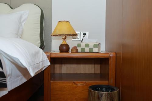 Postel nebo postele na pokoji v ubytování 厦门岚屿海景民宿