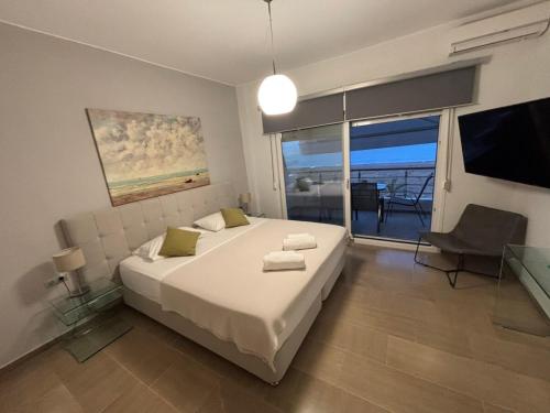 Photo de la galerie de l'établissement Korelis Apartments, à Agía Ánna