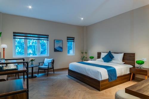 Katil atau katil-katil dalam bilik di Anise Luxe Home