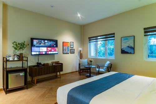 Televisyen dan/atau pusat hiburan di Anise Luxe Home