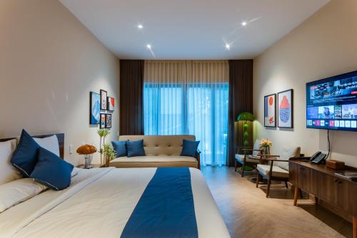 Katil atau katil-katil dalam bilik di Anise Luxe Home
