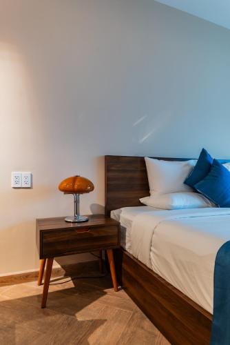 Katil atau katil-katil dalam bilik di Anise Luxe Home