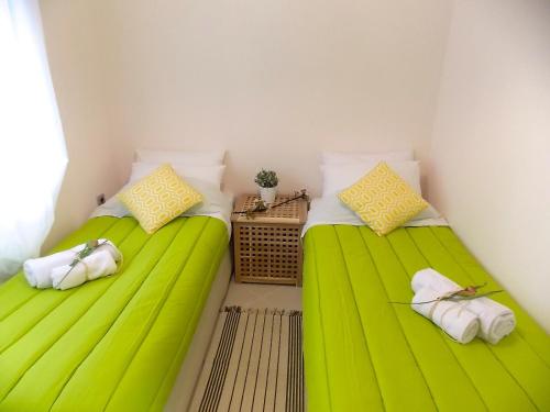 A bed or beds in a room at Filippos Resort II by Karidi