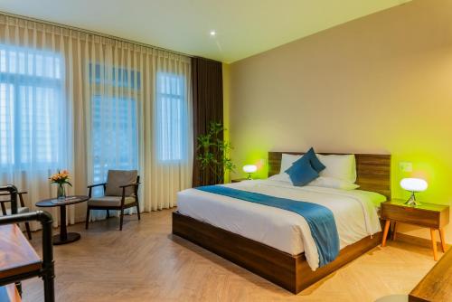 Katil atau katil-katil dalam bilik di Anise Luxe Home