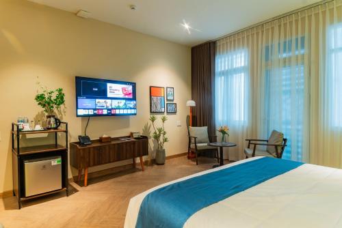 Televisyen dan/atau pusat hiburan di Anise Luxe Home