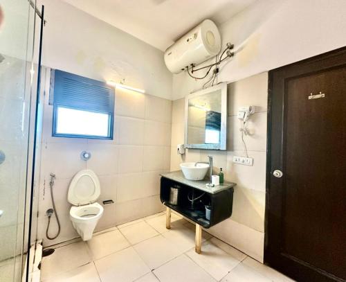 Koupelna v ubytování Hotel Grand Arcasia Saket- Near PVR Anupam