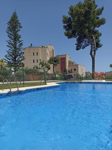 Céntrico apartamento cozy con piscina y parking