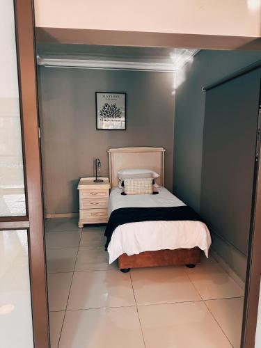 Ένα ή περισσότερα κρεβάτια σε δωμάτιο στο Lemon & Blue Guest House