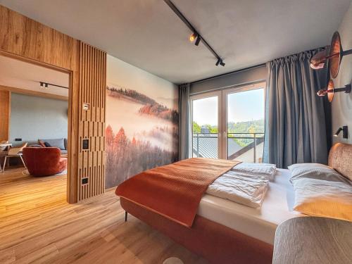 Ένα ή περισσότερα κρεβάτια σε δωμάτιο στο Apartamenty Szóstka - Kamienna 1D