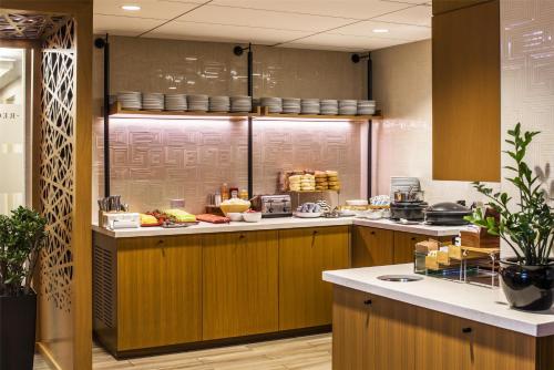 a kitchen with a counter with food on it at Hyatt Regency Chicago in Chicago
