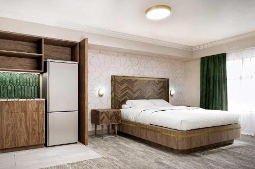 Postel nebo postele na pokoji v ubytování Velora Hinton, Ascend Hotel Collection