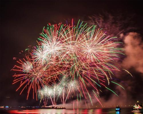 a firework display in the sky over the water at Hyatt Regency Chicago in Chicago