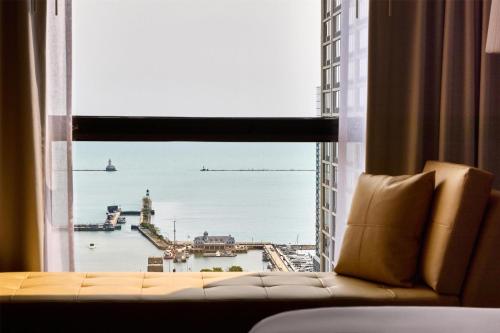 a room with a window with a view of the water at Hyatt Regency Chicago in Chicago