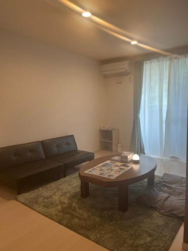 Χώρος καθιστικού στο Hana Hostel Fujisan Apartment