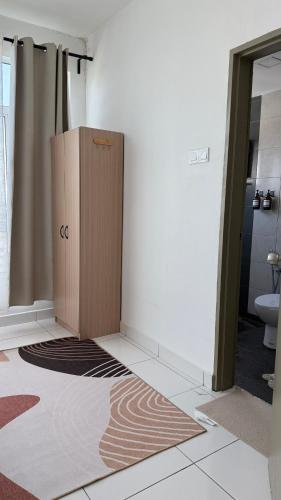 a bathroom with a cardboard box on the floor at Spacious Flat with Breakfast Wifi 3 Free Parking at Seksyen 7 in Shah Alam