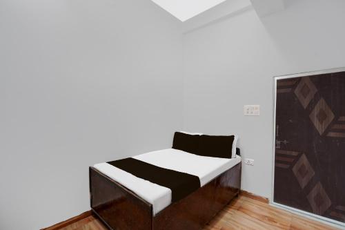 Postel nebo postele na pokoji v ubytování HOTEL O FOOD PLAZA