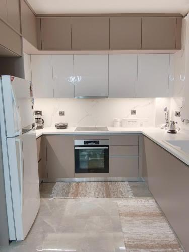 Kuchyň nebo kuchyňský kout v ubytování Kostis Apartment