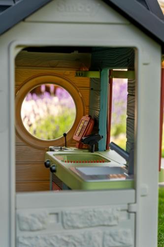 a close up of a toy house with a window at Villa Couleur in Diksmuide