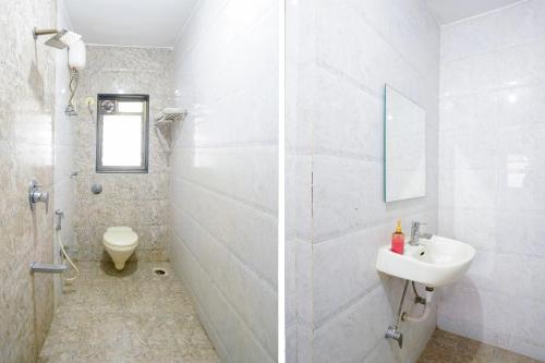 Ein Badezimmer in der Unterkunft FabHotel Rio House Apartment