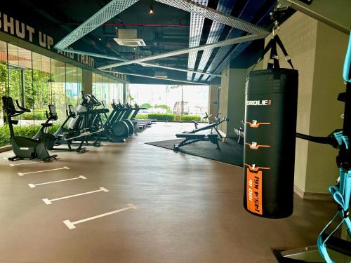 a gym with a punching bag hanging from the ceiling at KL Central 32 Floor KLCC View in Kuala Lumpur