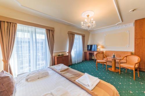 Postel nebo postele na pokoji v ubytování Hotel Bajkal