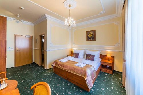 Postel nebo postele na pokoji v ubytování Hotel Bajkal