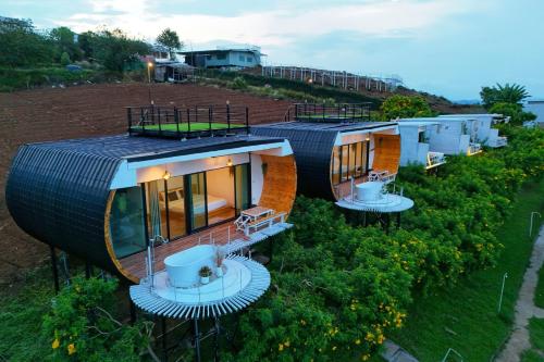 an image of a house with a roof at ดอกฟ้า ม่อนแจ่ม in Mon Jam