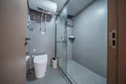 Koupelna v ubytování Xiamen Bashi Living Room B&B 厦门八适客厅民宿