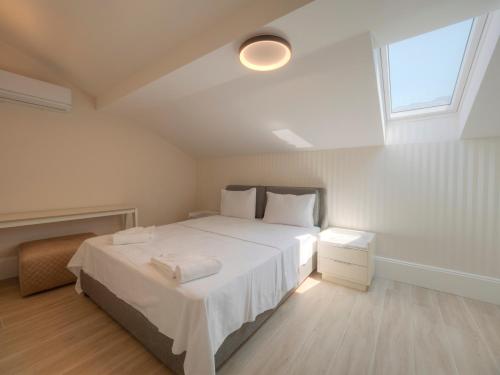 Postel nebo postele na pokoji v ubytování CASA AL MARE RESIDENCE