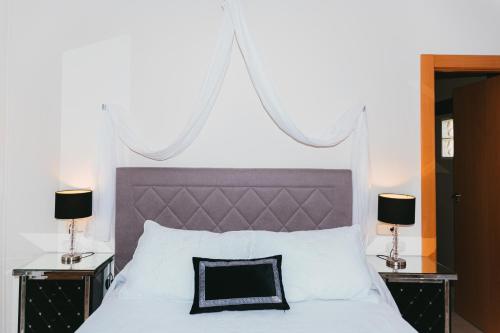 Postel nebo postele na pokoji v ubytování Hostal Mont Royal
