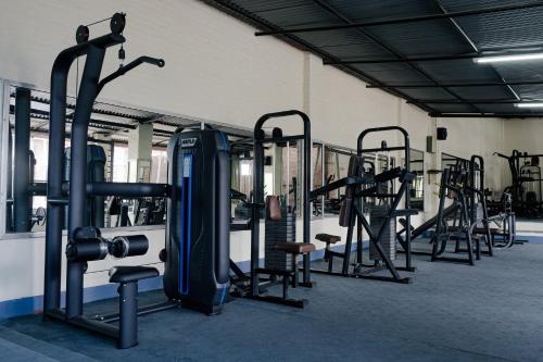 a gym with several rows of tread machines at Club Bagmati by HSH in Bhaktapur