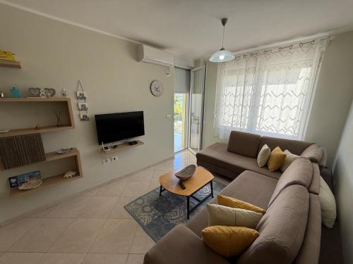 Et tv og/eller underholdning på Shengjin Apartments