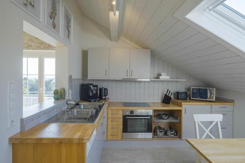Η κουζίνα ή μικρή κουζίνα στο Happy Hugle Haus
