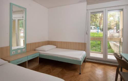 Postelja oz. postelje v sobi nastanitve Hostel Spinut